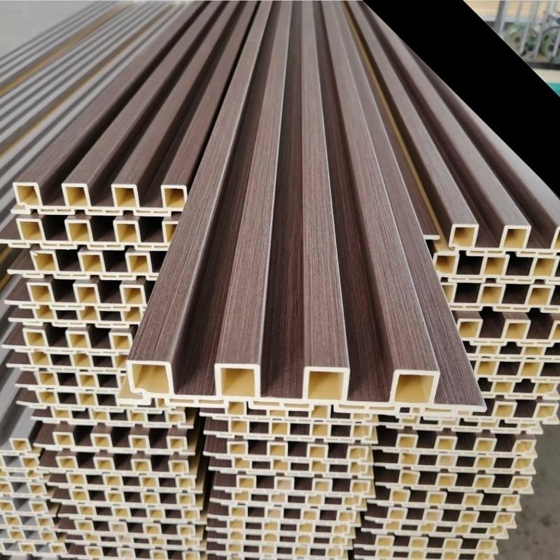 Los granos de madera de madera laminaron el panel de pared interior de WPC para la decoración interior